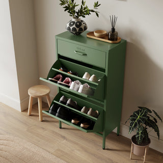 The Shoreditch shoe cabinet in forest with a top drawer, two lower shoe compartments and matching handles, styled in a hallway.